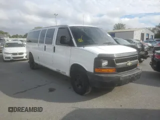 2014 Chevrolet Express Passenger 1LS with VIN 1GAZGZFAXE1105162, listed as a Copart auction lot 72773154 with 97,950 mi miles and Salvage title. Bid and sale history available at DreamBid. Image 4.