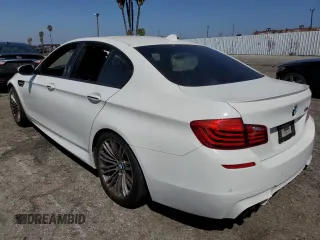 2014 BMW M5 with VIN WBSFV9C57ED097570, listed as a Copart auction lot 69757854 with 0 mi miles and Salvage Title. Bid and sale history available at carsss.com. Image 2.