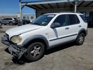 1999 Mercedes-Benz M 320/430/500 with VIN 4JGAB54EXXA118655, listed as a Copart auction lot 63286835 with 131,630 mi miles and Salvage title. Bid and sale history available at DreamBid. Image 1.