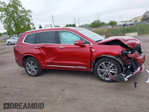2024 Cadillac XT6 AWD Premium Luxury with VIN 1GYKPDRSXRZ724989, listed as a IAAI auction lot 42378559 with 22,520 mi miles and . Bid and sale history available at DreamBid. Image 13.