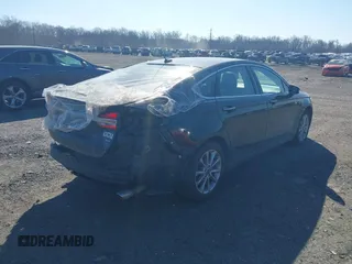2018 Ford Fusion Energi SE with VIN 3FA6P0PU8JR152890, listed as a IAAI auction lot 41682965 with 84,890 mi miles. Bid and sale history available at carsss.com. Image 4.