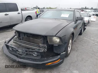 2009 Ford Mustang with VIN 1ZVHT80N495139131, listed as a IAAI auction lot 42019441 with 195,952 mi miles and . Bid and sale history available at carsss.com. Image 2.