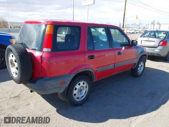 1999 Honda CR-V LX with VIN JHLRD2847XC009921, listed as a IAAI auction lot 41795325 with 268,638 mi miles. Bid and sale history available at carsss.com. Image 4.