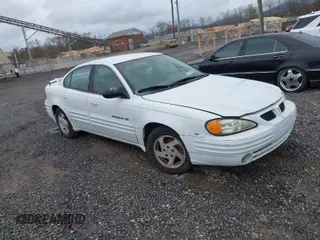 1999 Pontiac Grand Am SE1 with VIN 1G2NE52EXXM781713, listed as a IAAI auction lot 41914492 with 148,435 mi miles. Bid and sale history available at carsss.com. Image 1.