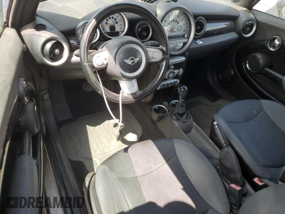 2009 MINI Convertible с VIN WMWMR33589TU96481, выставлен на аукционе Copart как лот 52785515 с пробегом 144 792 миль миль и Чистый • Clean title. История ставок и продаж доступна на DreamBid. Изображение 8.