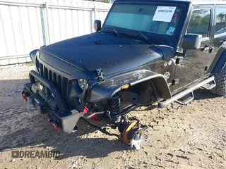 2008 Jeep Wrangler Unlimited X с VIN 1J4GA39178L652983, выставлен на аукционе IAAI как лот 40803698 с пробегом 114 012 миль миль и . История ставок и продаж доступна на DreamBid. Изображение 6.
