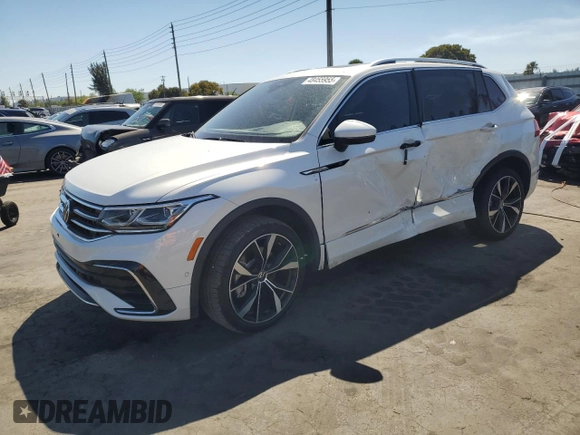 2024 Volkswagen Tiguan SEL R-Line with VIN 3VV4B7AX9RM043389, listed as a Copart auction lot 48455955 with 8,707 mi miles and Salvage title. Bid and sale history available at DreamBid. Image 1.