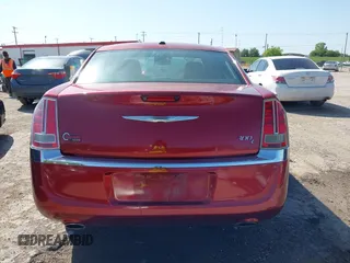 2014 Chrysler 300 with VIN 2C3CCAEG5EH372859, listed as a IAAI auction lot 42004993 with 204,587 mi miles. Bid and sale history available at carsss.com. Image 16.