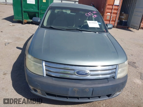 2008 Ford Taurus SEL with VIN 1FAHP27W38G109131, listed as a IAAI auction lot 41739444 with 147,848 mi miles. Bid and sale history available at carsss.com. Image 6.