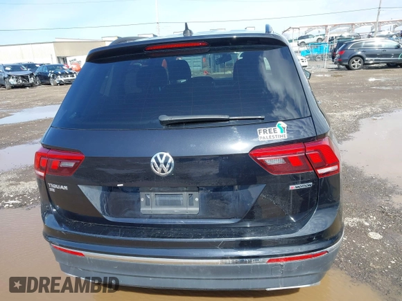 2020 Volkswagen Tiguan SE with VIN 3VV2B7AX5LM091857, listed as a IAAI auction lot 41922727 with 83,464 mi miles and . Bid and sale history available at DreamBid. Image 16.