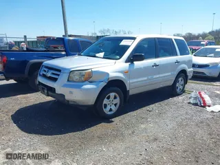 2007 Honda Pilot LX with VIN 5FNYF18167B027915, listed as a IAAI auction lot 41819509 with 206,684 mi miles. Bid and sale history available at carsss.com. Image 2.