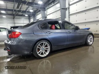 2014 BMW 3 Series 335i xDrive with VIN WBA3B9C59EP458568, listed as a Copart auction lot 61133085 with 177,009 mi miles and Salvage title. Bid and sale history available at DreamBid. Image 3.
