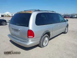 1999 Chrysler Town & Country LXi with VIN 1C4GP54L9XB872347, listed as a IAAI auction lot 41611666 with 224,817 mi miles. Bid and sale history available at carsss.com. Image 4.