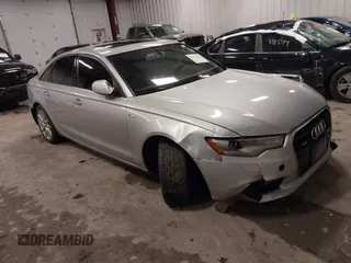 2013 Audi A6 Premium Plus z VIN WAUGGAFC1DN128710, wystawiony jako IAAI lot #39112721 z przebiegiem 187 530 mil mil oraz . Historia ofert i sprzedaży dostępna na DreamBid. Obrazek 1.