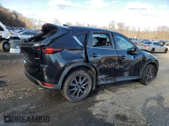 2018 Mazda CX-5 Touring with VIN JM3KFBCM3J0382258, listed as a Copart auction lot 50463005 with 61,887 mi miles and Salvage Title. Bid and sale history available at carsss.com. Image 3.