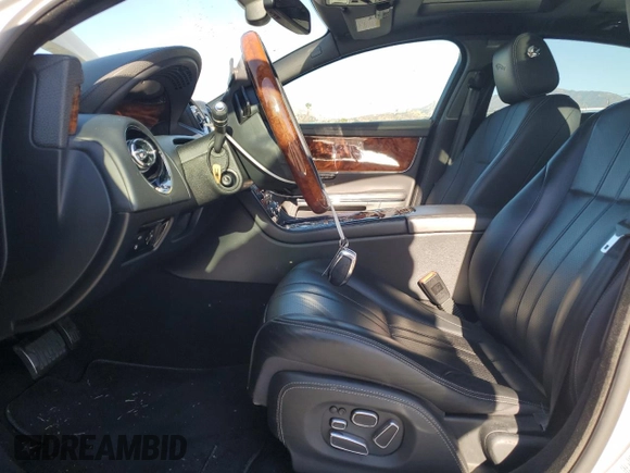 2011 Jaguar XJ with VIN SAJWA1JC0BMV13347, listed as a Copart auction lot 87699375 with Not Provided miles and Salvage Title. Bid and sale history available at DreamBid. Image 7.
