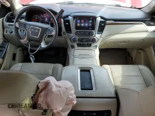 2015 GMC Yukon Denali with VIN 1GKS2CKJ6FR136152, listed as a Copart auction lot 76967664 with 137,208 mi miles and Salvage Title. Bid and sale history available at carsss.com. Image 8.