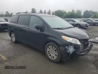 2015 Toyota Sienna XLE с VIN 5TDYK3DC6FS531521, выставлен на аукционе Copart как лот 62923695 с пробегом 135 782 миль миль и Списание • Salvage title. История ставок и продаж доступна на DreamBid. Изображение 4.