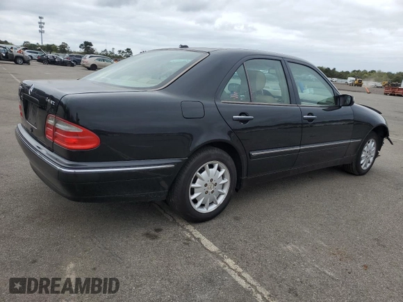 2001 Mercedes-Benz E-Class AWD with VIN WDBJF82J91X060969, listed as a Copart auction lot 71986544 with 113,694 mi miles and Salvage Title. Bid and sale history available at carsss.com. Image 3.