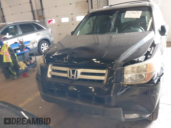 2007 Honda Pilot EX-L with VIN 2HKYF18647H504953, listed as a IAAI auction lot 41750435 with 186,097 mi miles and . Bid and sale history available at DreamBid. Image 6.