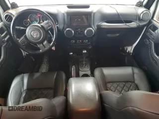 2012 Jeep Wrangler Unlimited Sport z VIN 1C4BJWDG4CL140250, wystawiony jako Copart lot #55174665 z przebiegiem 91 285 mil mil oraz Szkoda całkowita • Salvage title. Historia ofert i sprzedaży dostępna na DreamBid. Obrazek 8.