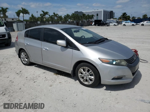 2010 Honda Insight EX with VIN JHMZE2H74AS032878, listed as a Copart auction lot 56230795 with 125,838 mi miles and Clean title. Bid and sale history available at DreamBid. Image 4.