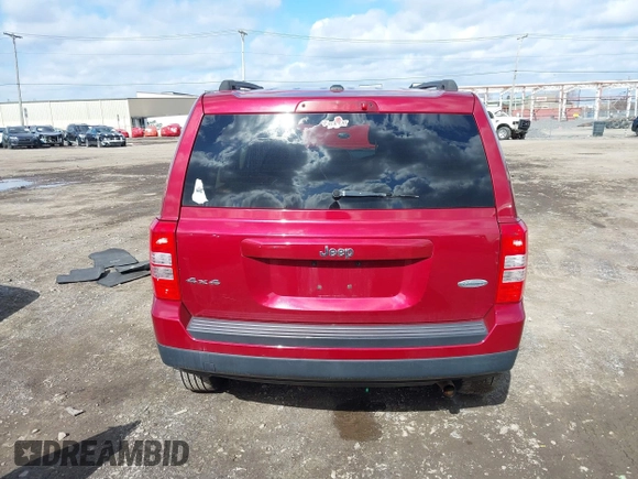 2014 Jeep Patriot Latitude with VIN 1C4NJRFB4ED897890, listed as a IAAI auction lot 41978399 with 76,688 mi miles. Bid and sale history available at carsss.com. Image 16.