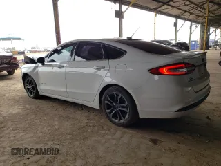 2018 Ford Fusion Hybrid SE with VIN 3FA6P0LU2JR169528, listed as a Copart auction lot 44660413 with 84,158 mi miles. Bid and sale history available at carsss.com. Image 2.