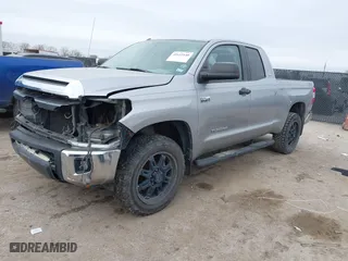 2015 Toyota Tundra 4WD Truck SR with VIN 5TFUW5F10FX489707, listed as a IAAI auction lot 41633440 with 106,855 mi miles. Bid and sale history available at carsss.com. Image 18.