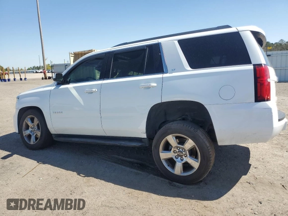 2015 Chevrolet Tahoe LT with VIN 1GNSCBKC1FR661681, listed as a Copart auction lot 49865695 with 191,306 mi miles and Salvage Title. Bid and sale history available at DreamBid. Image 2.