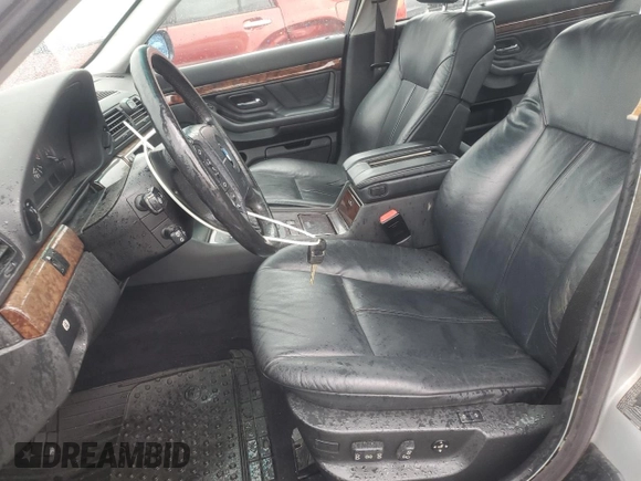 2000 BMW 7 Series 740iL z VIN WBAGH8346YDP11594, wystawiony jako Copart lot #56964665 z przebiegiem 165 495 mil mil oraz Tytuł czysty. Historia ofert i sprzedaży dostępna na DreamBid. Obrazek 7.