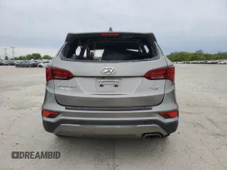 2017 Hyundai Santa Fe 2.4L z VIN 5NMZUDLB0HH042101, wystawiony jako Copart lot #55058145 z przebiegiem Nie podano mil oraz Szkoda całkowita • Salvage title. Historia ofert i sprzedaży dostępna na DreamBid. Obrazek 6.