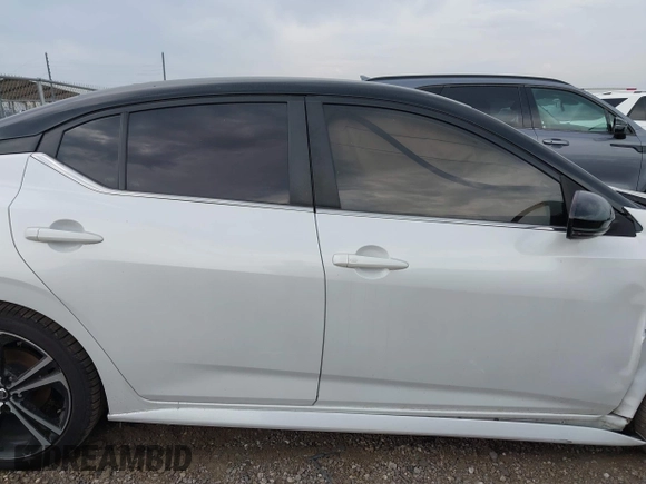 2020 Nissan Sentra SR z VIN 3N1AB8DV6LY241609, wystawiony jako IAAI lot #42255322 z przebiegiem 52 193 mil mil oraz . Historia ofert i sprzedaży dostępna na DreamBid. Obrazek 14.