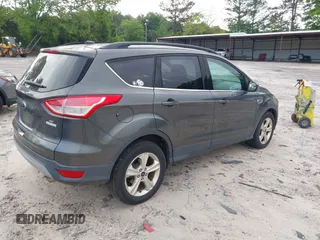 2016 Ford Escape SE with VIN 1FMCU0GX3GUC05279, listed as a IAAI auction lot 42142557 with 87,177 mi miles. Bid and sale history available at carsss.com. Image 4.