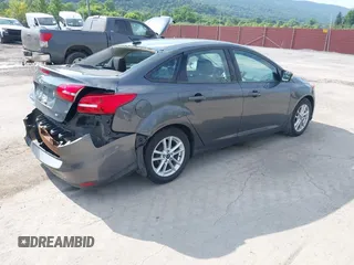 2017 Ford Focus SE with VIN 1FADP3F21HL213532, listed as a IAAI auction lot 42680885 with 77,930 mi miles and . Bid and sale history available at DreamBid. Image 4.