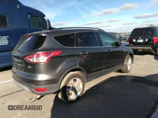 2016 Ford Escape SE with VIN 1FMCU9G99GUA33121, listed as a IAAI auction lot 37495107 with 107,366 mi miles. Bid and sale history available at carsss.com. Image 4.