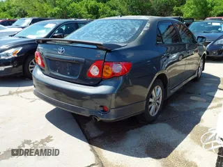 2010 Toyota Corolla with VIN 2T1BU4EEXAC463697, listed as a IAAI auction lot 42099807 with 206,160 mi miles. Bid and sale history available at carsss.com. Image 4.