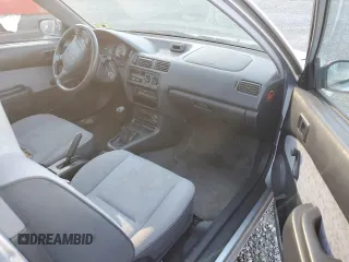 1997 Toyota Tercel CE z VIN JT2AC52L1V0227973, wystawiony jako Copart lot #77300554 z przebiegiem 301 799 mil mil oraz Szkoda całkowita • Salvage title. Historia ofert i sprzedaży dostępna na DreamBid. Obrazek 8.