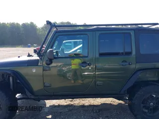 2007 Jeep Wrangler Unlimited X с VIN 1J4GA39197L115109, выставлен на аукционе IAAI как лот 42582190 с пробегом 141 080 миль миль и . История ставок и продаж доступна на DreamBid. Изображение 14.