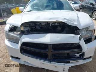 2014 Dodge Charger SXT with VIN 2C3CDXJG9EH255078, listed as a IAAI auction lot 41880363 with 124,864 mi miles. Bid and sale history available at carsss.com. Image 6.