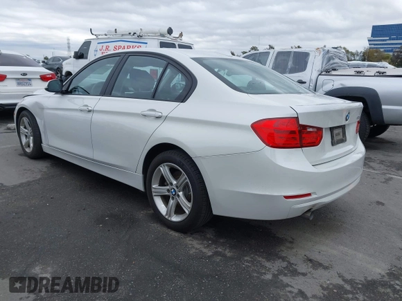 2015 BMW 3 Series 320i with VIN WBA3B1C5XFK137171, listed as a IAAI auction lot 41736278 with 28,673 mi miles. Bid and sale history available at carsss.com. Image 3.