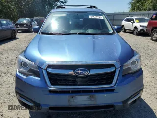 2017 Subaru Forester Touring with VIN JF2SJAWC2HH429099, listed as a Copart auction lot 64671135 with 104,709 mi miles and Salvage title. Bid and sale history available at DreamBid. Image 5.