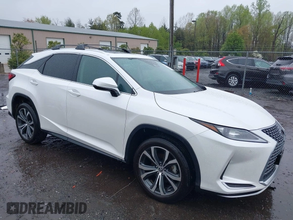 2021 Lexus RX with VIN 2T2HZMDA3MC266624, listed as a IAAI auction lot 42011029 with 27,401 mi miles. Bid and sale history available at carsss.com. Image 1.