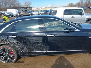 2017 Cadillac CT6 Platinum AWD z VIN 1G6KN5R64HU175275, wystawiony jako IAAI lot #41683802 z przebiegiem 75 604 mil mil oraz . Historia ofert i sprzedaży dostępna na DreamBid. Obrazek 13.