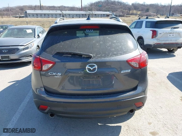 2016 Mazda CX-5 Grand Touring with VIN JM3KE4DY5G0837958, listed as a IAAI auction lot 41713313 with NaN miles. Bid and sale history available at carsss.com. Image 16.