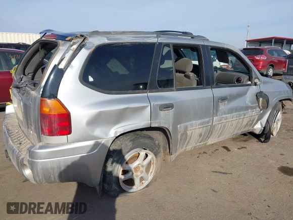 2004 GMC Envoy SLT with VIN 1GKDT13S742133932, listed as a IAAI auction lot 41598339 with 168,651 mi miles and . Bid and sale history available at DreamBid. Image 4.