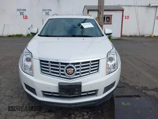 2016 Cadillac SRX Luxury Collection z VIN 3GYFNBE33GS507014, wystawiony jako IAAI lot #41979980 z przebiegiem 115 077 mil mil oraz . Historia ofert i sprzedaży dostępna na DreamBid. Obrazek 13.