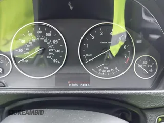 2015 BMW 3 Series 328i with VIN WBA3A5C59FF606236, listed as a IAAI auction lot 41690502 with 115,085 mi miles. Bid and sale history available at carsss.com. Image 7.