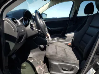 2016 Mazda CX-5 Touring z VIN JM3KE2CY5G0617516, wystawiony jako Copart lot #56421005 z przebiegiem 110 739 mil mil oraz Szkoda całkowita • Salvage title. Historia ofert i sprzedaży dostępna na DreamBid. Obrazek 7.