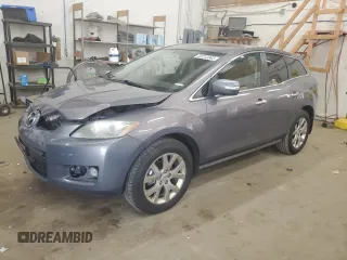 2009 Mazda CX-7 Grand Touring z VIN JM3ER293X90219881, wystawiony jako Copart lot #53212345 z przebiegiem 193 324 mil mil oraz Szkody całkowita. Historia ofert i sprzedaży dostępna na DreamBid. Obrazek 1.